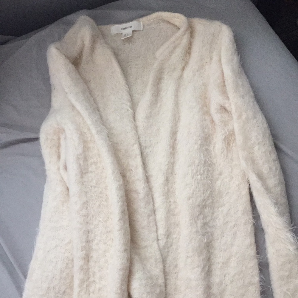 Cream colored eyelash sweater coat